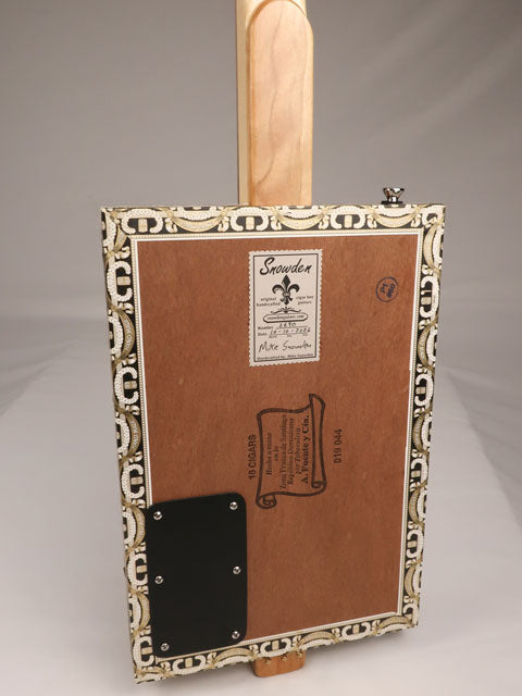 Back view of a 3 string cigar box guitar made with a Queen B Fuente cigar box. This cigar box guitar is handmade by Mike Snowden of Snowden Guitars.