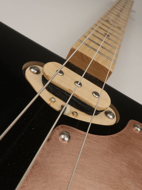 Close up view of a 3 string cigar box guitar pickup. Handmade by Mike Snowden for sale.