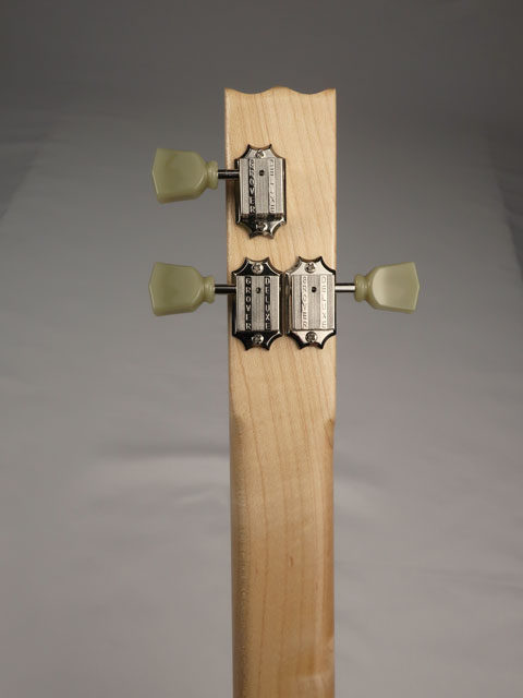 Back view Cigar Box Guitar neck and headstock with Snowden guitars logo. Maple neck and fretboard with grover tuners.