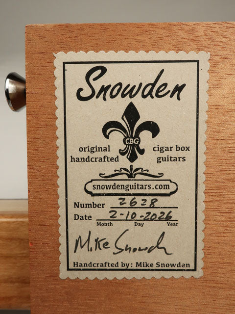 Back of cigar box guitar with Snowden guitars logo sticker. Padron cigar box guitar made by Mike Snowden.