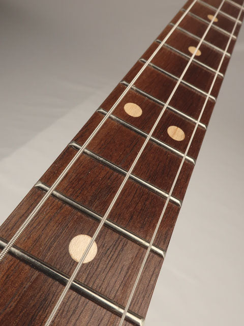 3 string cigar box guitar neck with walnut fretboard amd maple inlay. Made by Mike Snowden.