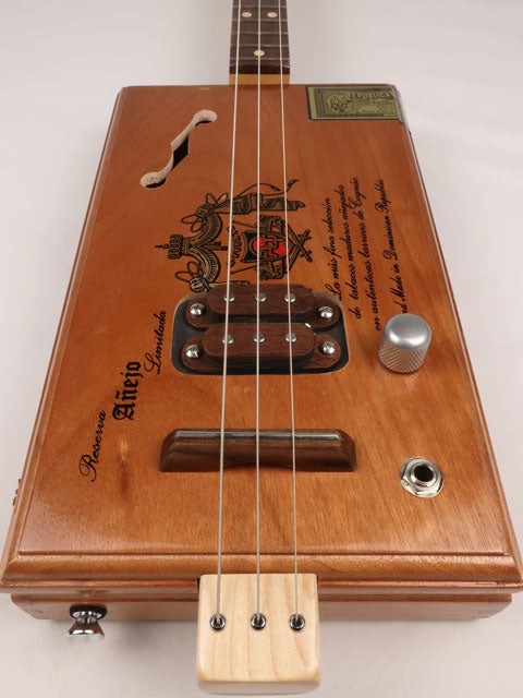Front view of a 3 string cigar box guitar A-Fuente handmade by Mike Snowden of Snowden Guitars.