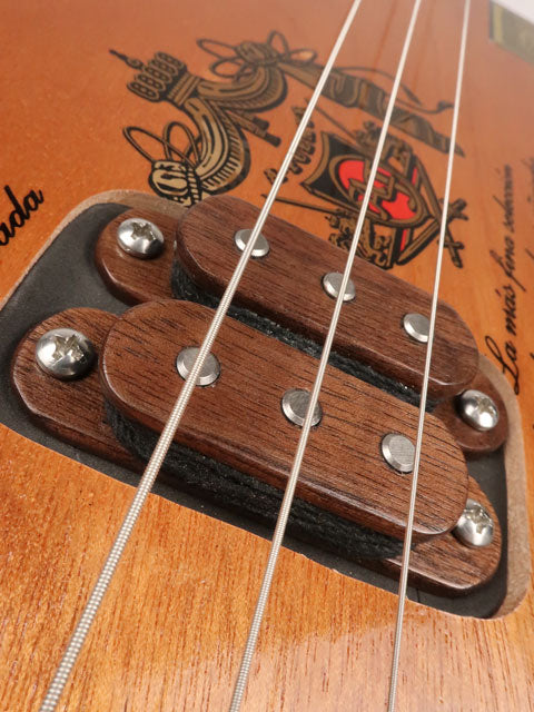 Close up view of a 3 string cigar box guitar pickup humbucker A-Fuente handmade by Mike Snowden of Snowden Guitars.