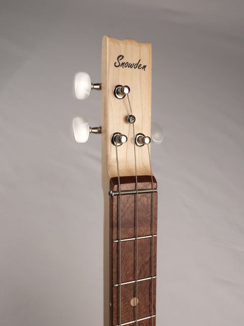Front view of a 3 string cigar box guitar with a Snowden Guitars logo on the front headstock. This cigar box guitar is made with a maple neck and sapele fretboard by Mike Snowden of Snowden Guitars.