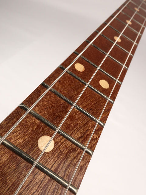 Front view of a 3 string cigar box guitar with sapele fret board and maple inlay. This cigar box guitar neck was handmade by Mike Snowden of Snowden Guitars.