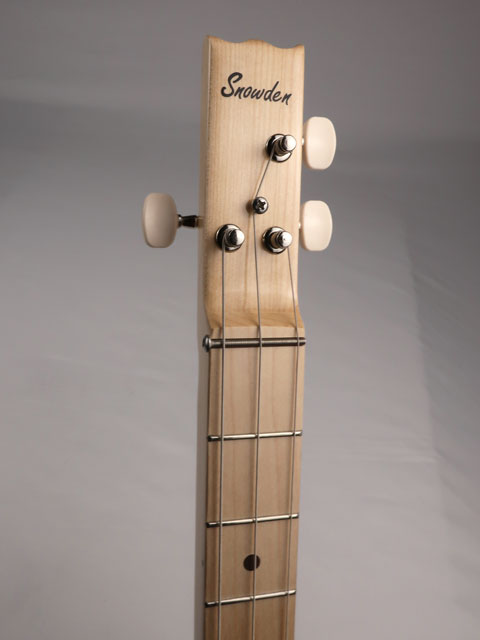 Front view of a 3 string cigar box guitar neck with Snowden Guitars logo on the headstock.