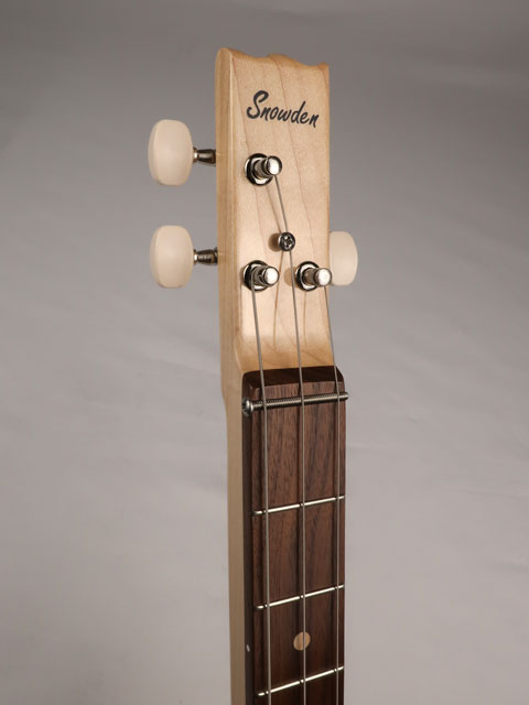 Front view of a 3 string cigar box guitar with Snowden Guitars logo on the headstock.