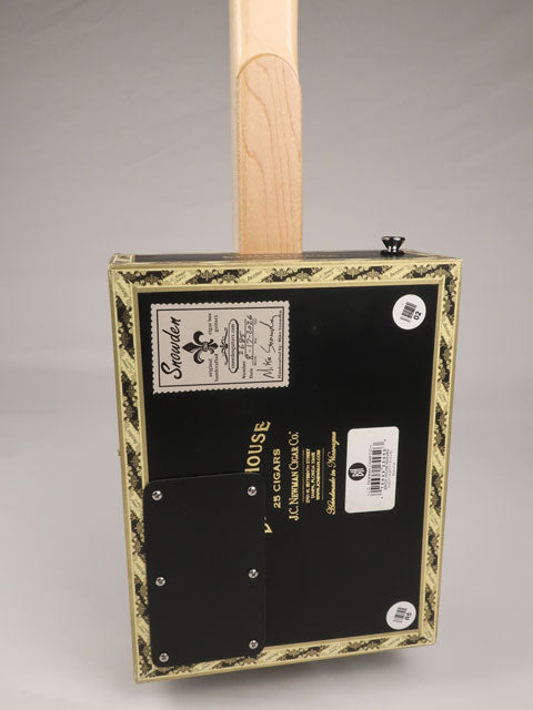 Back view of a 4 string cigar box guitar made with a Brick House cigar box. This cigar box guitar is made with a maple single coil pickup handmade Mike Snowden of Snowden Guitars.