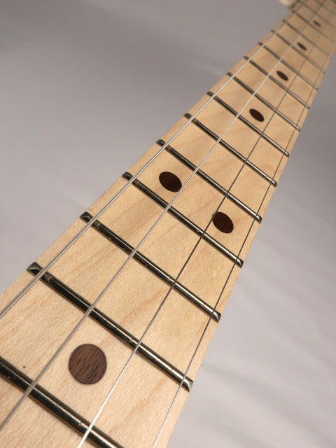 Front view of a  string cigar box guitar neck made with a maple neck and walnut inlay. Handmade by Mike Snowden of Snowden Guitars.