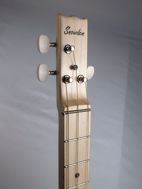 Cigar Box Guitar 3 string headstock made from maple with a snowden guitars logo in black on the front top of the headstock.