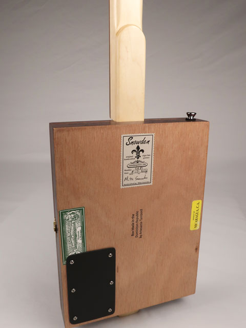 Back view of a 3 string cigar box guitar handmade by Mike Snowden of Snowden Guitars. This CBG is made with a New Orleans Cigar Factory cigar box.