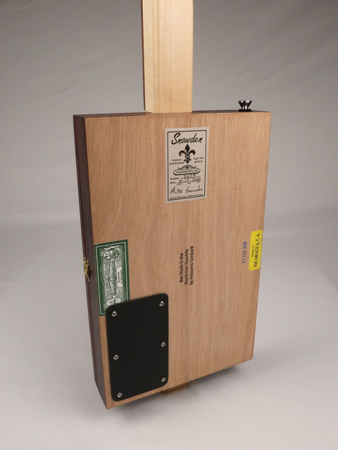 Back view of a 3 string cigar box guitar made with a New Orleans Cigar Factory cigar box handmade by Mike Snowden of Snowden Guitars.