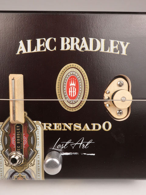Front view of a one string cigar box guitar made with a Alec Bradley cigar box. Handmade by Mike Snowden of Snowden Guitars. 