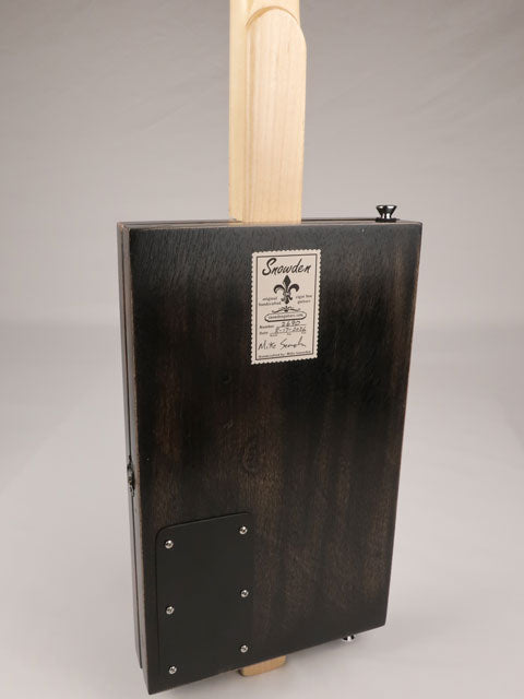 Back view of a 3 string cigar box guitar with a copper pick guard and maple humbucker. This cigar box guitar is handmade by Mike Snowden of Snowden Guitars.