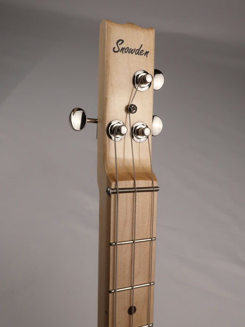 Front view of a 3 string cigar box guitar with Snowden Guitars logo printed on the front of the headstock.