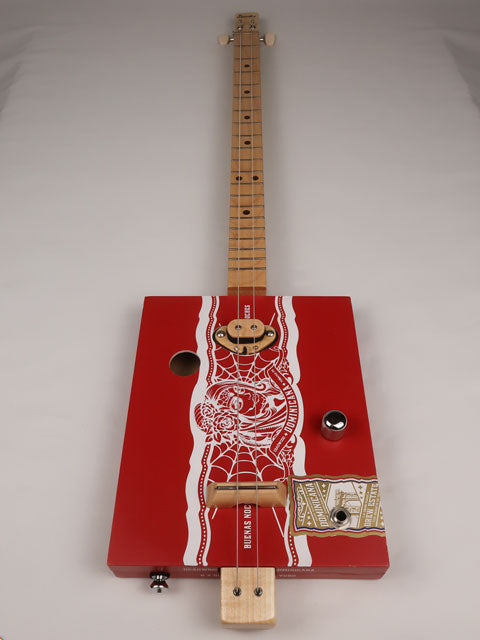 Front view of a 2 string cigar box guitar made with a Deadwood Dominicana cigar box. Handmade by Mike Snowden of Snowden Guitars in Marietta GA USA.