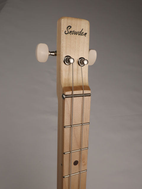 Front view of a 2 string cigar box guitar made with a maple neck and walnut inlay. Hand made by Mike Snowden of Snowden Guitars.