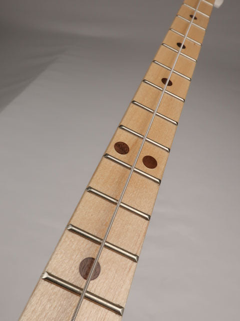 Front view of a one string cigar box guitar diddly bow handmade by Mike Snowden of Snowden Guitars.