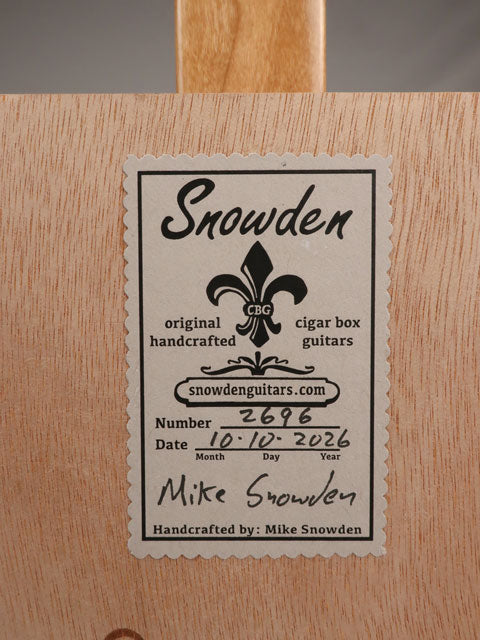 Back view of a cigar box guitar with a Jaime Garcia cigar box. This cigar box guitar is handmade by Mike Snowden of Snowden Guitars.