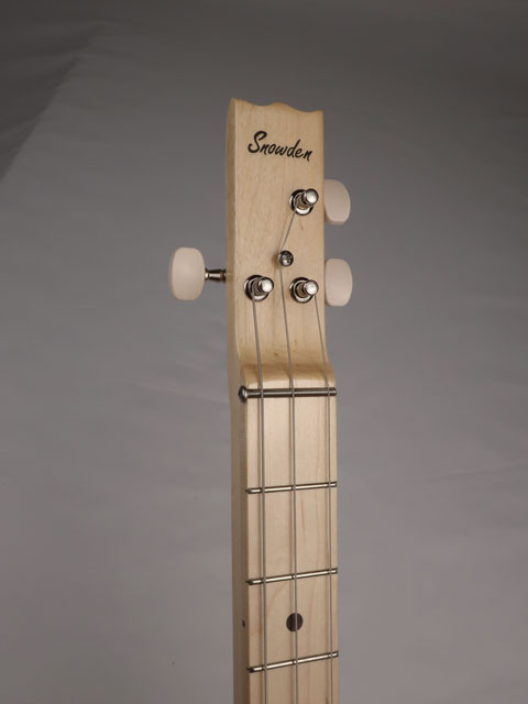 Front view of a 3 string cigar box guitar neck and headstock with Snowden Guitars logo on the front.